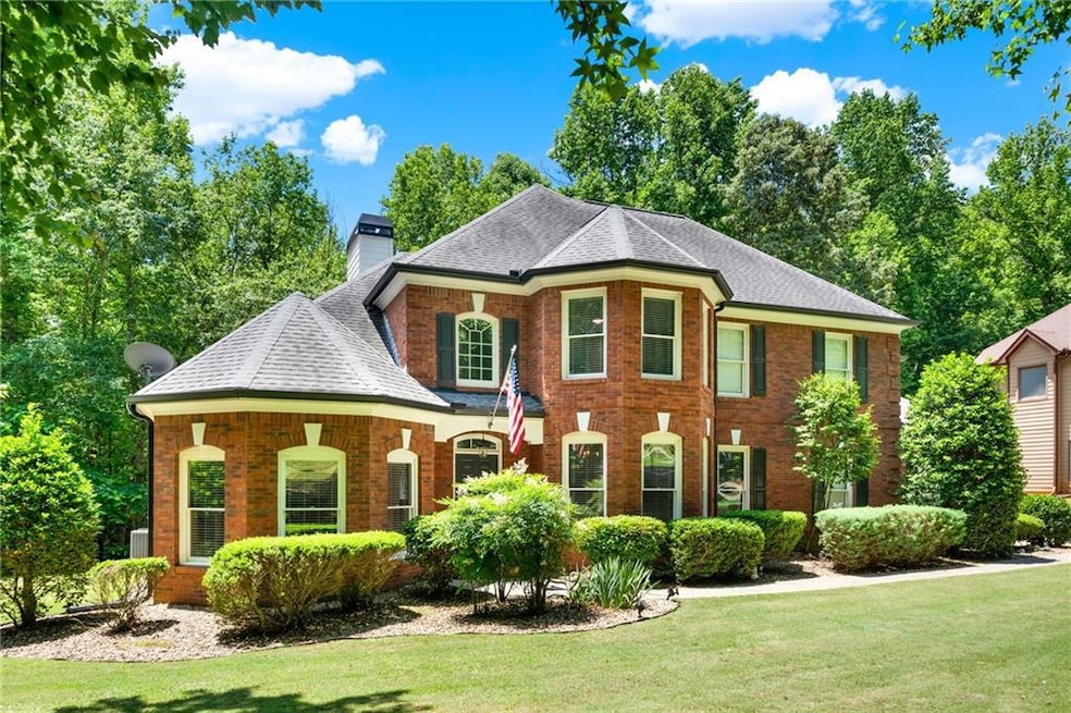 View of front of property with a front lawn