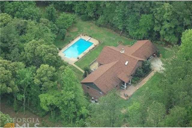 Five acres of private, wooded resort to call your 