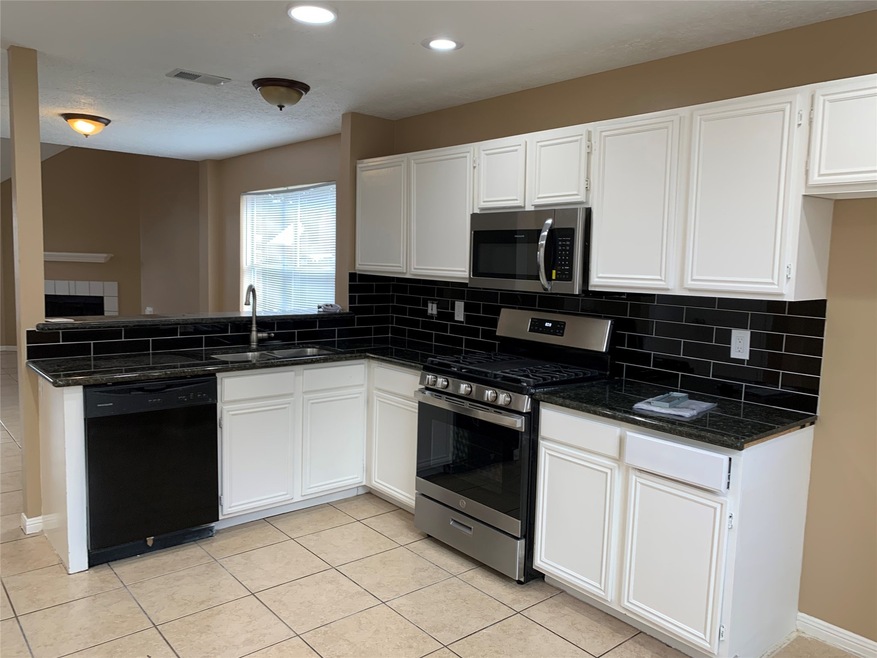 8910 Inwood North Dr, Houston, TX 77088 - photo 1