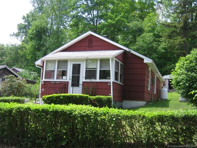 Front with enclosed porch.