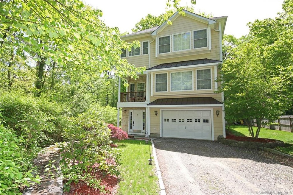 Nestled in serene and natural privacy, this house 