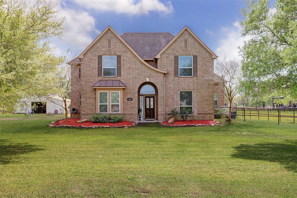 3005 Lago St, Alvin, TX 77511 - photo 1