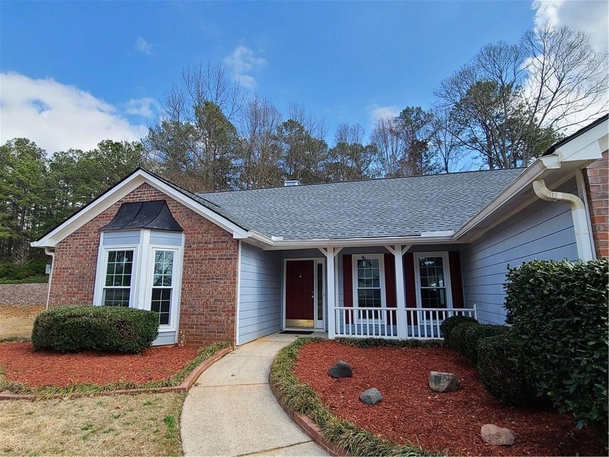 Ranch-style house featuring a porch