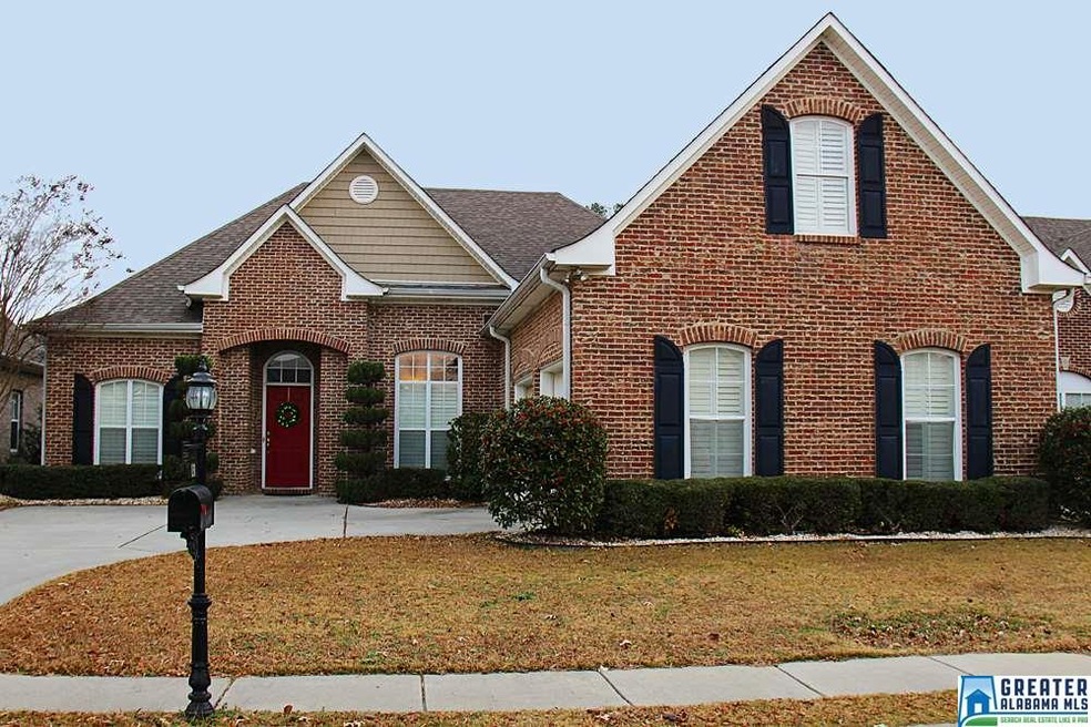 All brick 2 car garage home with sidewalks and won