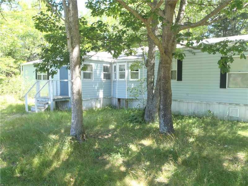 Exterior Front. Spacious front yard...