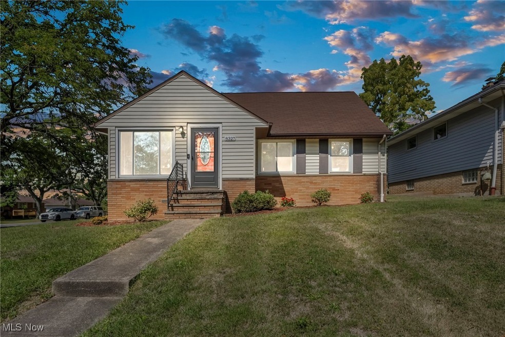 Bungalow-style home featuring a yard
