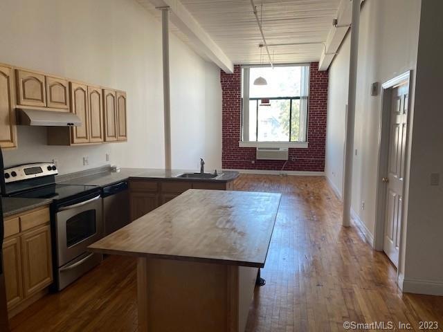 Kitchen with new appliances and island