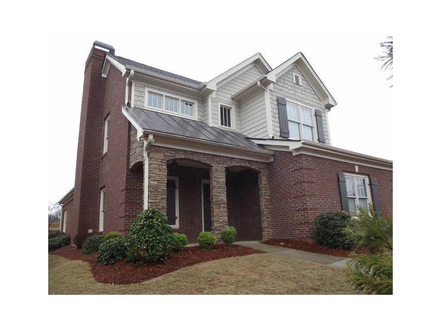 Exterior Front. STACKED STONE FRONT PORCH * BRICK 