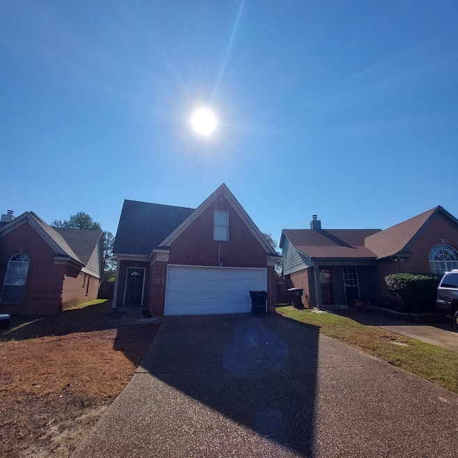 View of front of home featuring a garage