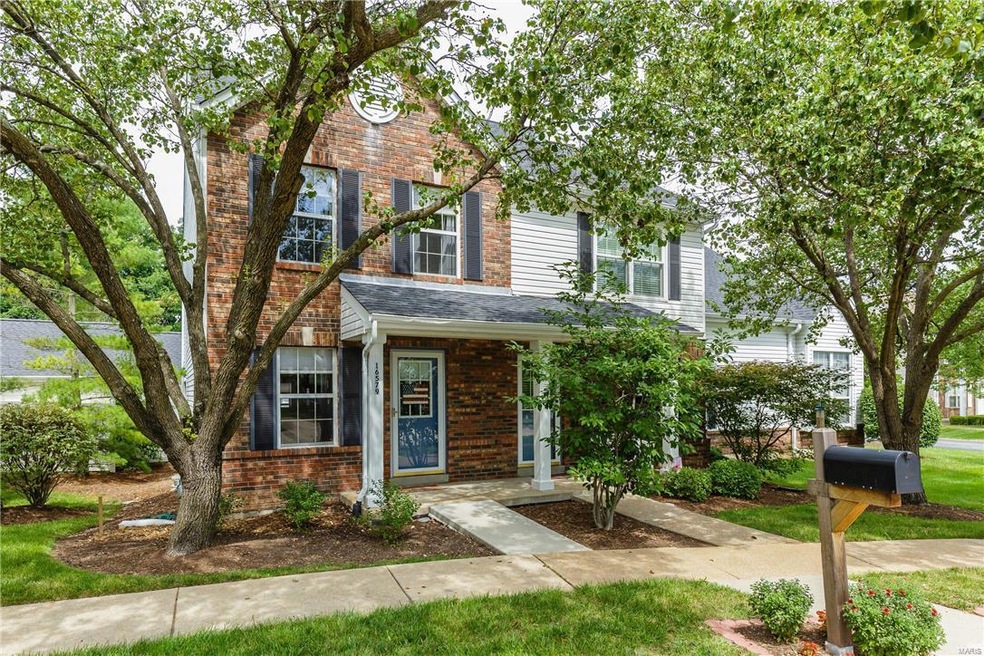 Welcome to 16579 Carriage View Court, the end unit
