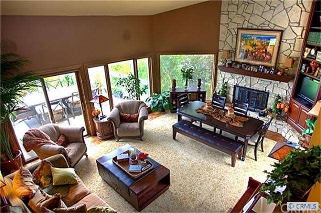 Great Room with Picture Windows out to private dec