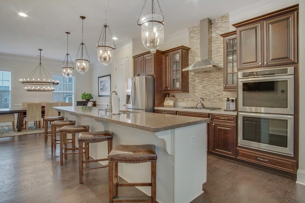 This chef's kitchen features stainless steel appli