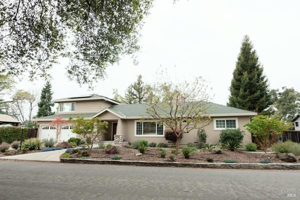 A modern smooth stucco finish, two-car garage with