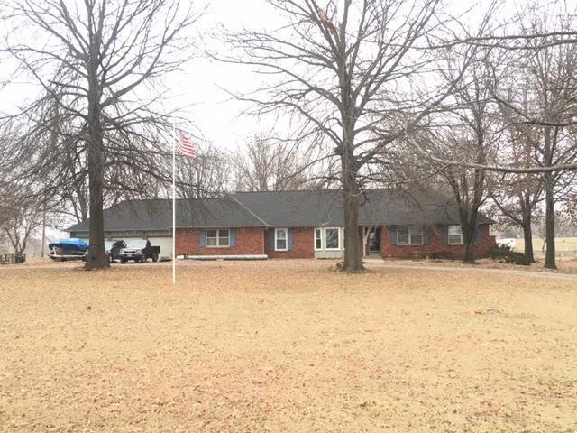 901 N Madison St, Raymore, MO 64083 - photo 1