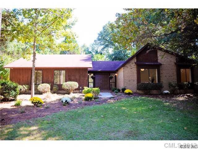 Exterior Front - Sprawling brick and cedar ranch o
