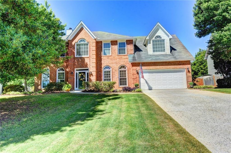 This beautiful four bedroom home sits on a quiet c