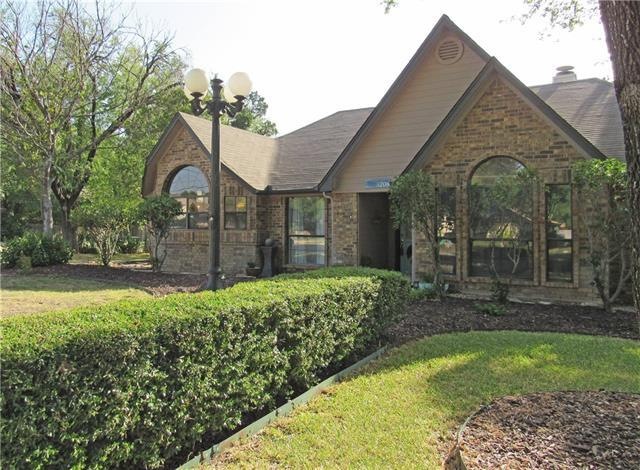 Gorgeous brick family home situated on over a quar