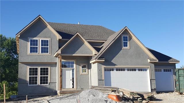 1709 Knoll Creek Ln, Raymore, MO 64083 - photo 1