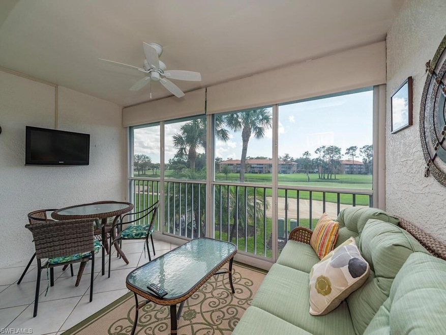 Sunroom with plenty of natural light and ceiling f