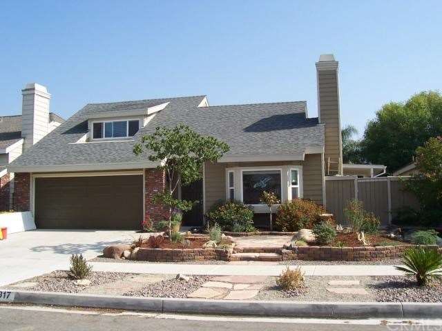 Newly landscaped front with drought tolerant plant