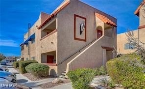 View of side of property with stucco siding