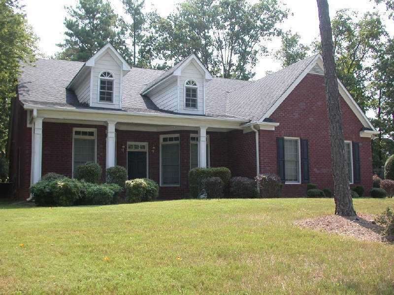 Exterior Front. 3 Sides Brick 1 1/2 Story