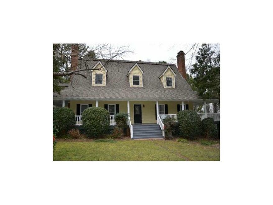 Exterior Front. Country cedar farmhouse with wrap 