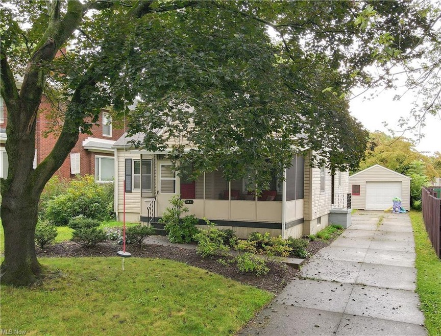 View of property hidden behind natural elements fe
