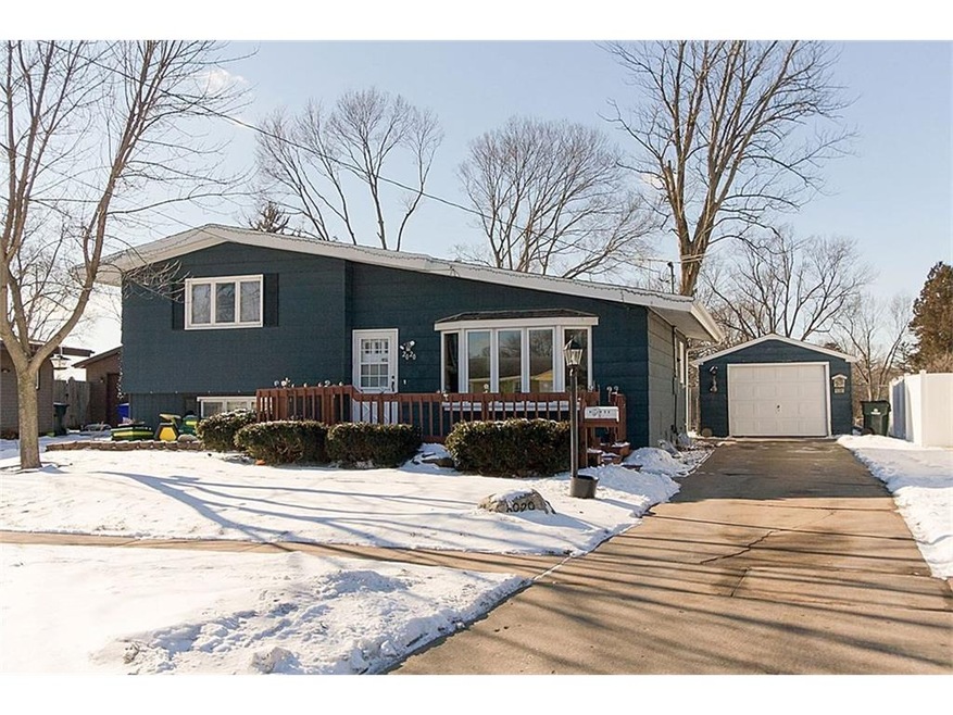 Front View of home with a very large deck
