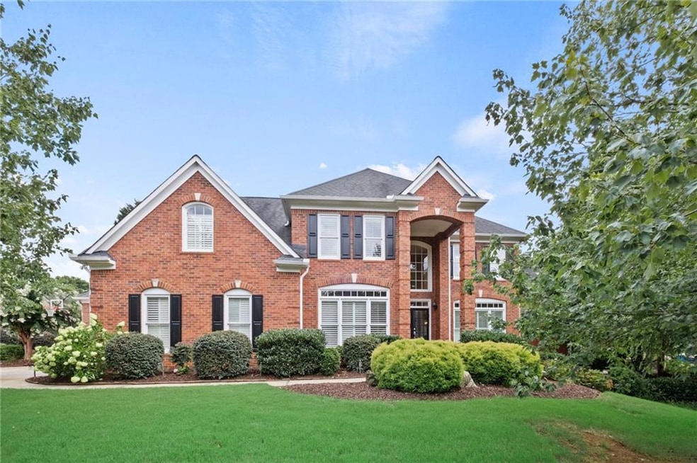 Colonial inspired home with a front yard