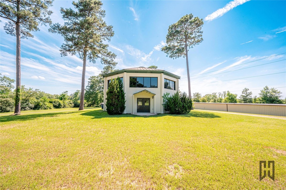 Octagonal 2 Story home with 2 acres & Shop
