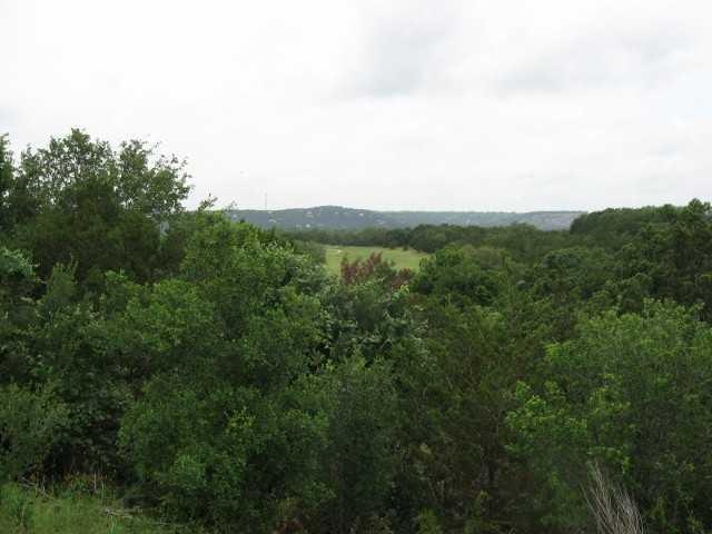View from top of lot looking past lot down to golf