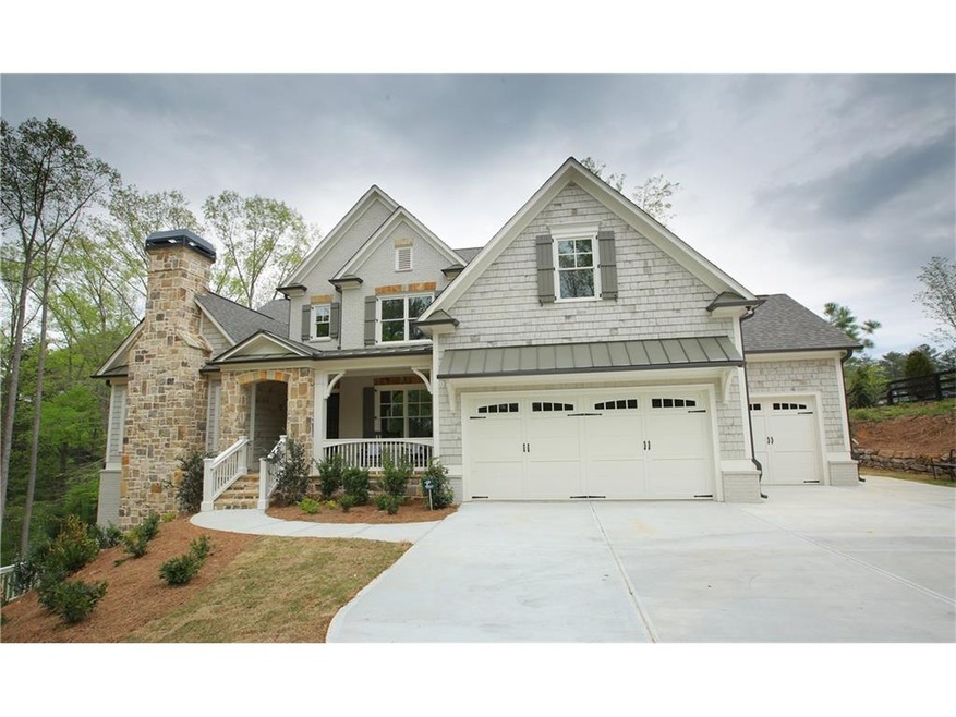 The Denton C has a charming brick, stone and cedar
