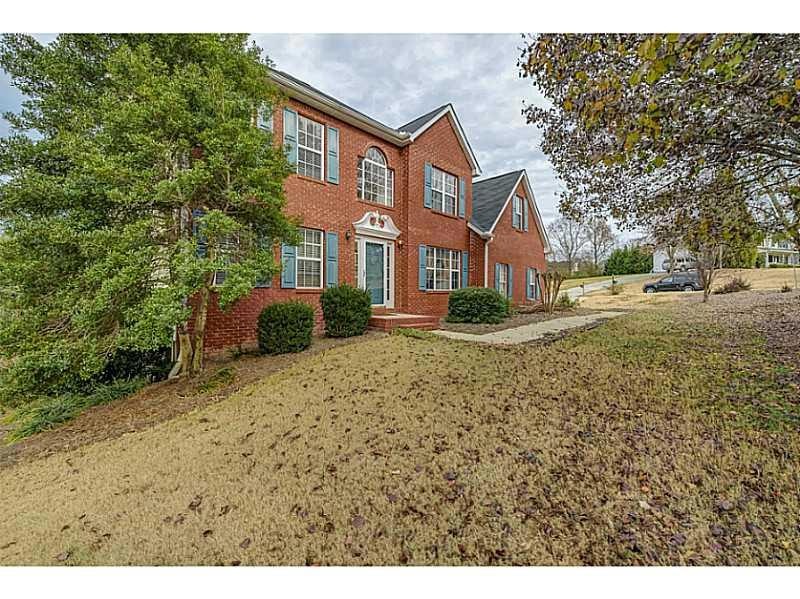 Exterior Front. Brick beauty situated on huge corn