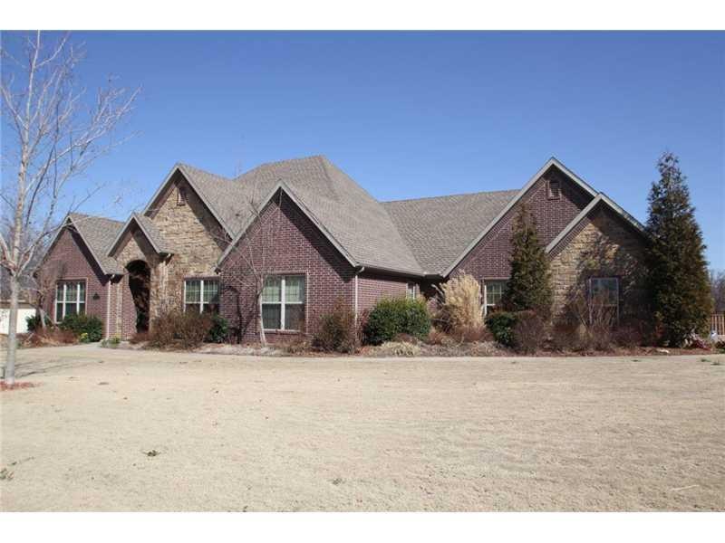 Exterior Front. Great looking 1 level house w/ extensive professional landscaping.