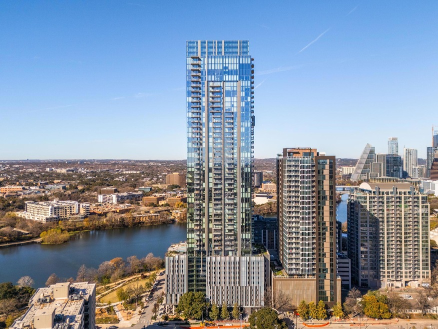 Property's view of city with a water view