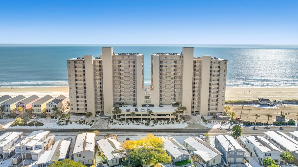 Drone / aerial view featuring a water view and a b