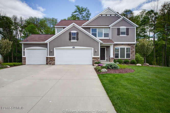 3614 Bridgehampton Dr NE Grand-small-001