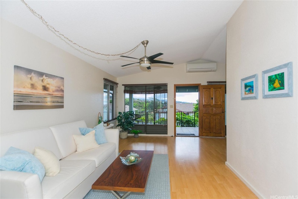 Open bright and breezy living area with split a/c 