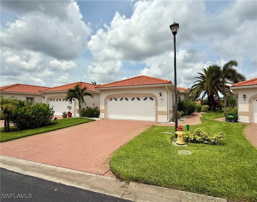Mediterranean / spanish-style house with a garage,