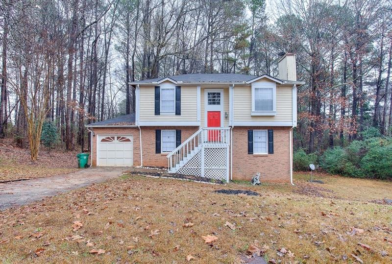 Updated split Foyer Home on a large wooded lot.