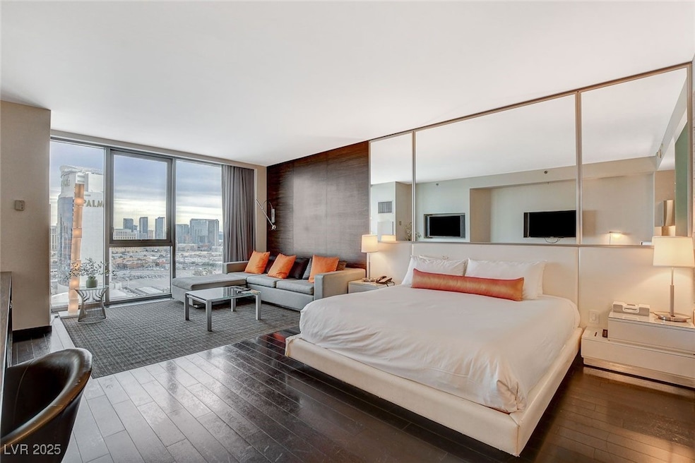 Bedroom with hardwood / wood-style flooring, floor