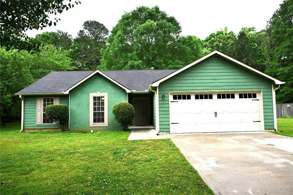 Ranch home featuring a brand new garage
