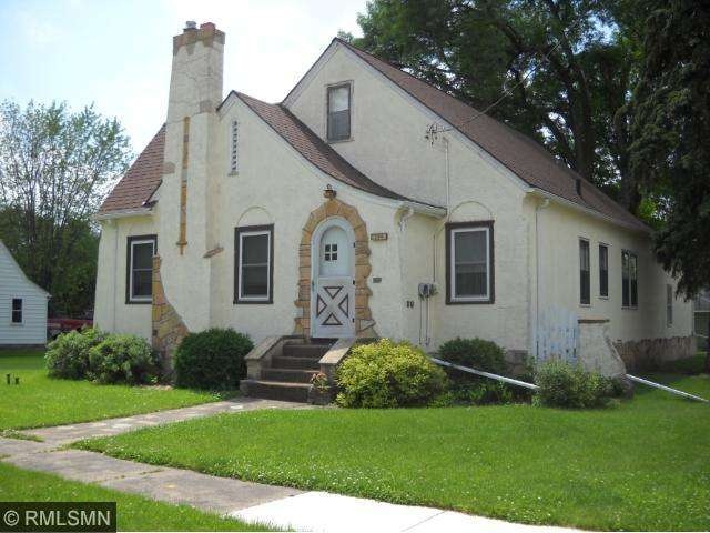 Front view with arched front door