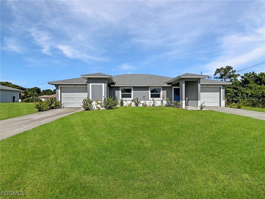 1306 W 12th St, Lehigh Acres, FL 33972 - photo 1