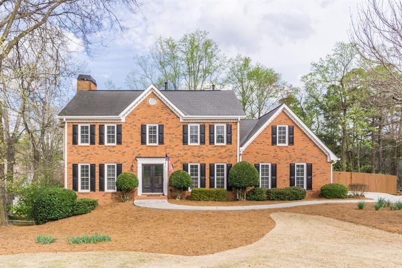 Welcome home! Beautiful 3 sided brick home on a pr
