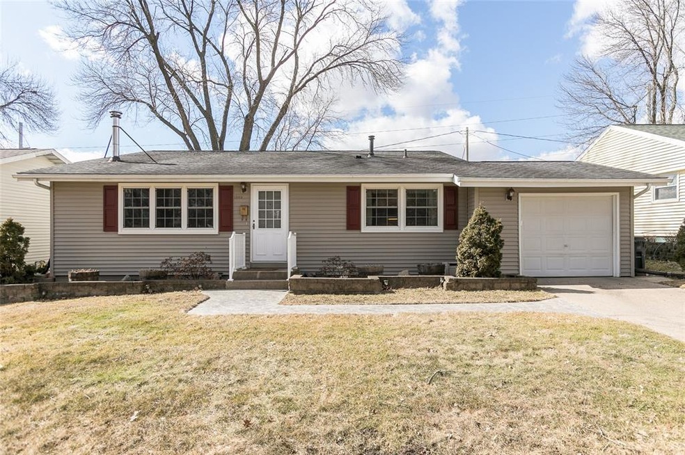 EXTENSIVE LANDSCAPING, STAMPED CONCRETE SIDEWALK, 