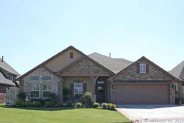 Exterior of Brick & Stone Home.  The Home Faces th