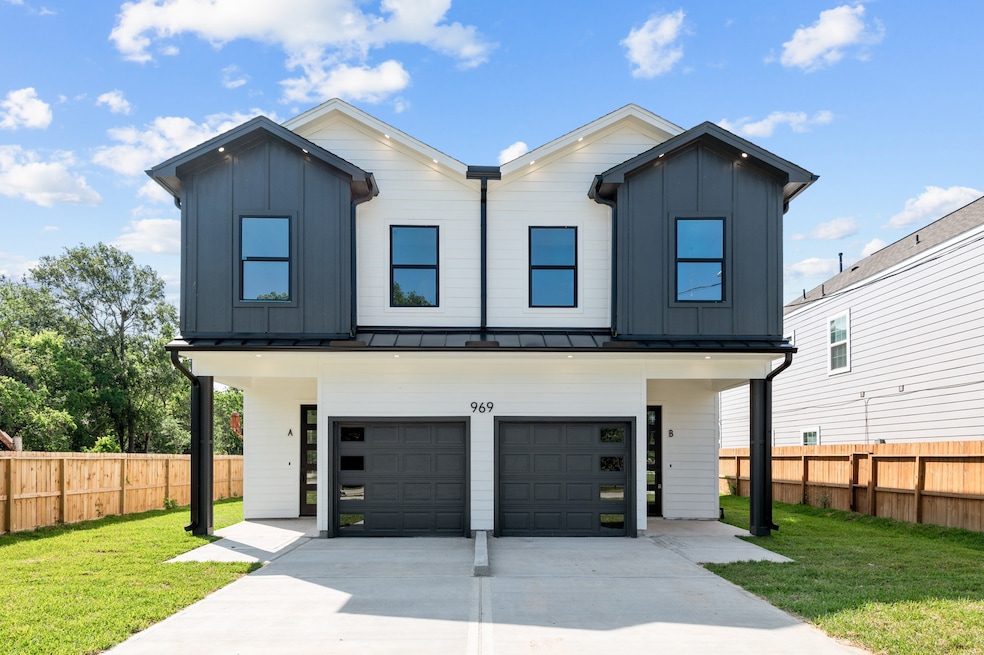 This modern duplex features a sleek design with co