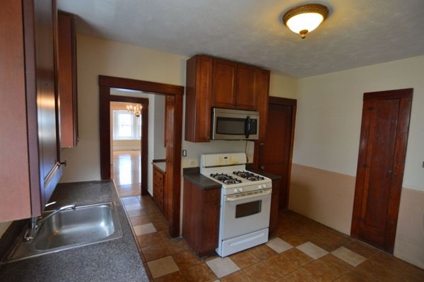 29 Gallivan Blvd unit 1, Dorchester Center, MA 02124 - photo 1